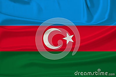 flag represents Azerbaijan's sovereignty and independence as nation on textured fabric, concept unique cultural Stock Photo