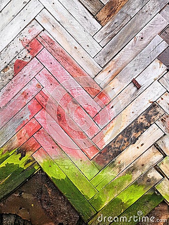 Colored old wooden wall and slats with mold. Painted green gray pink Wood Shabby Background Stock Photo