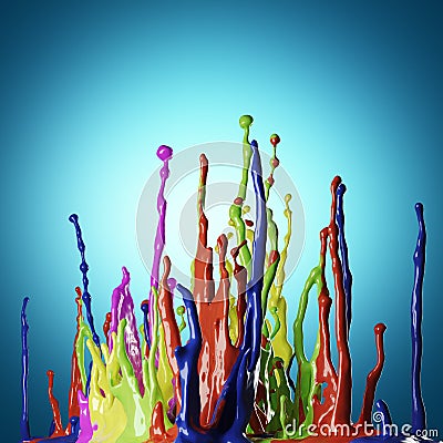 Colored paint splashes on blue background Stock Photo