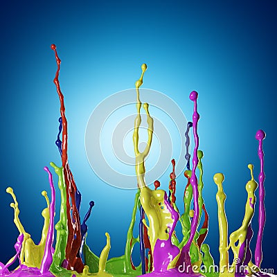 Colored paint splashes on blue background Stock Photo