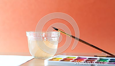 Colored paints on the table Stock Photo