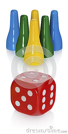 Colored pawns and red dice. Set pieces in the colors yellow, green, blue. Cube in red with white eyes. Stock Photo