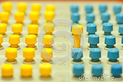 Colored pegs. Stock Photo