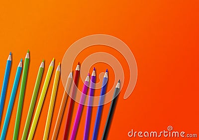 Colored pencil group isolated on orange. Horizontal background Stock Photo