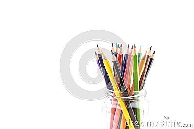 Colored pencils in a glass jar Stock Photo