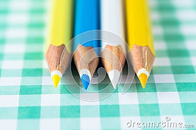 Colored pencils on a pastel background to a cage with space for text Stock Photo