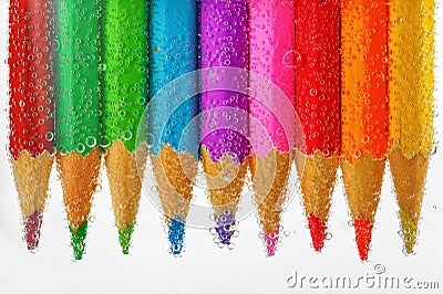 Colored pencils sunken in water Editorial Stock Photo