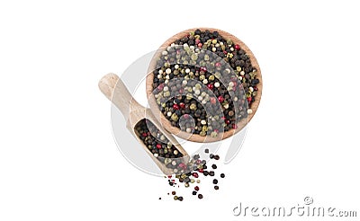 Colored pepper peppercorns in wooden bowl and scoop isolated on white background. top view. Spices and food ingredients Stock Photo