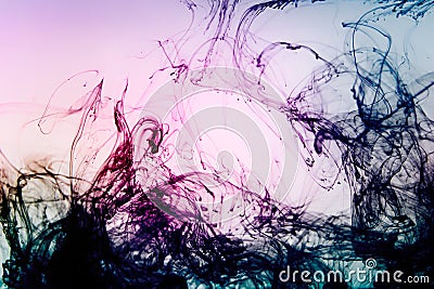 Colored photo of dissolving dye ink in water Stock Photo