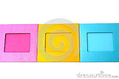 Colored photo frames in the middle on a white Stock Photo