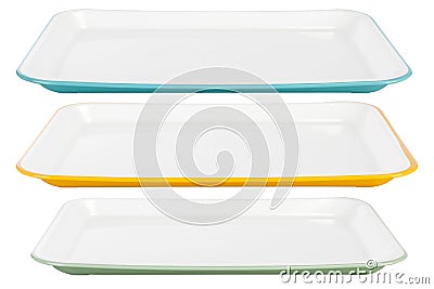 Colored plastic platters on white background Stock Photo