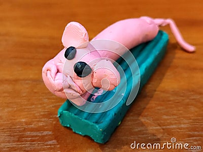 Colored plasticine sousage mouse Stock Photo