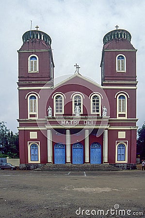 Colored in red ancient building of Matri dei Cathedral at Calicut state Kerala Editorial Stock Photo