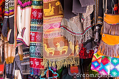 Colored scarves and bags in the local market in San Pedro de Atacama, Chile. With selective focus Stock Photo