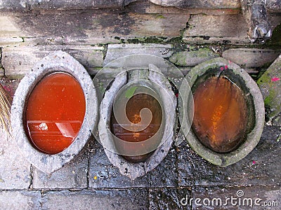 Colored water basins inside Hiranya Varna Mahavihar. Golden Temple. Patan, Kathmandu. Nepal Stock Photo