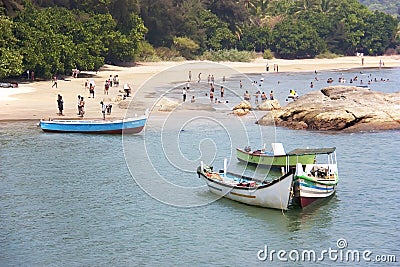 Colored wooden boats on the Om beach in Gokarna. Karnataka, India Editorial Stock Photo