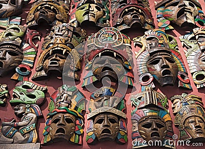 Colored wooden masks at a souvenir stand in Chichen Itza, Yucatan, Mexico Editorial Stock Photo