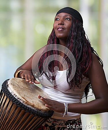 Colorful African Djembe Drummer Stock Photo