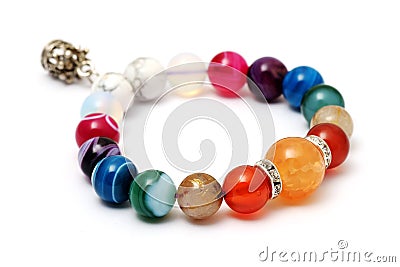 Colorful of agate,jasper bracelet decoratAe with silver crown pendant Stock Photo