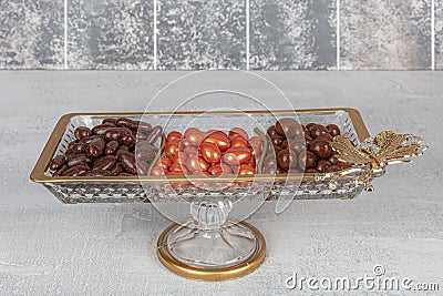 Colorful almond candies in the stylish, crystal candy bowl, almond sweets. The Sugar Feast concept. (Turkish name Ramadan - Stock Photo