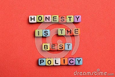 Colorful alphabet beads with phrase HONESTY IS THE BEST POLICY Stock Photo