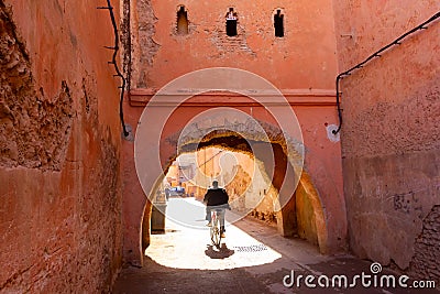 Colorful ancient old and narrow street in medina of Marrakech, Morocco, Africa Editorial Stock Photo