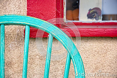 Colorful Antique Chair and Window Stock Photo