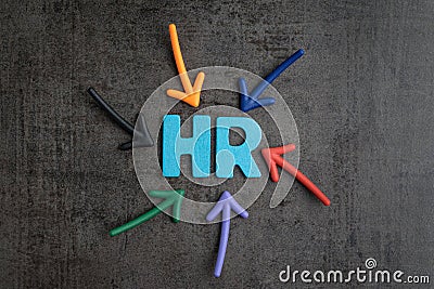 Colorful arrows pointing to the word HR at the center on black c Stock Photo