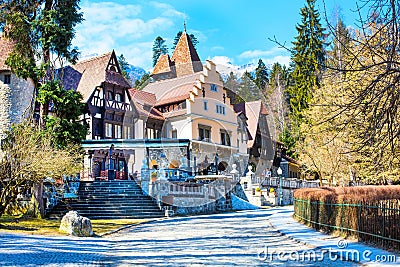 Colorful authentic restaurant in countryside Sinaia, Romania near Peles castle, snow mountains Stock Photo