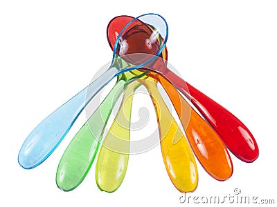 Colorful baby spoon set on white background Stock Photo
