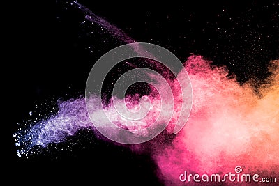 Colorful background of pastel powder explosion.Rainbow color dust splash on black background Stock Photo
