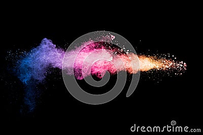 Colorful background of pastel powder explosion.Rainbow color dust splash on black background Stock Photo