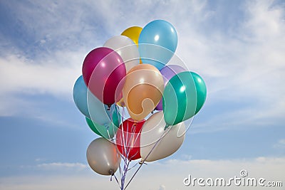 Colorful ballons in a blue sky Stock Photo