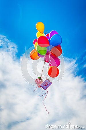 Colorful balloon on blue sky Stock Photo