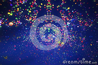 Colorful balloons flying into the blue sky at night. Holiday, festival and party background Stock Photo