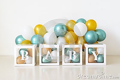 Colorful balloons and the inscription BABY. birthday. Photo session in the studio. Birthday ideas for kids. Photo zone Stock Photo