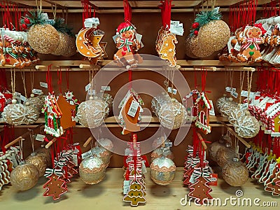 Colorful balls and gingerbread at Christmas market of Merano Editorial Stock Photo