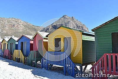 Colorful bathing cabins on the beach in Muizenberg in Cape Town, South Africa Stock Photo