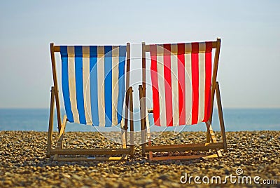 Colorful beach chairs Stock Photo