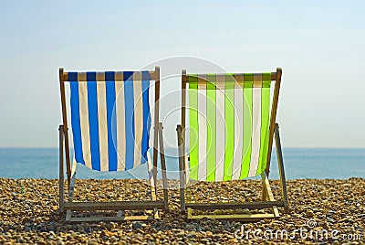 Colorful beach chairs Stock Photo