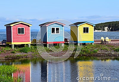Colorful beach huts in Cavendish Editorial Stock Photo