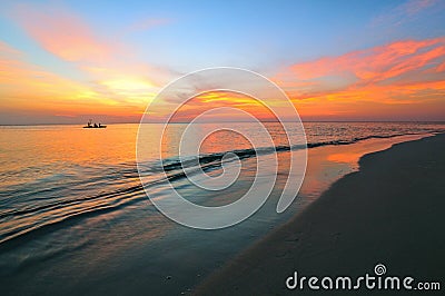 Colorful beach sunset Stock Photo