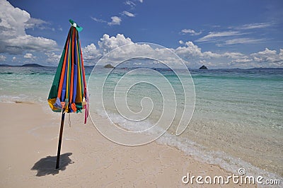 Colorful beach umbrella Stock Photo