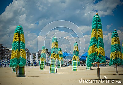 Colorful beach umbrellas on a deserted beach Stock Photo