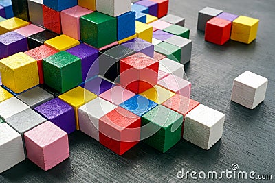 Colorful blocks as an abstract symbol of complex structure, interaction and diversity. Stock Photo