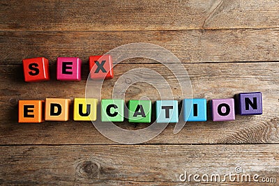 Colorful blocks with phrase `SEX EDUCATION` on wooden background Stock Photo