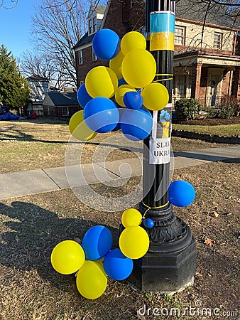 Colorful Blue and Yellow Ukrainian Protest Balloons Near the Bus Stop Editorial Stock Photo