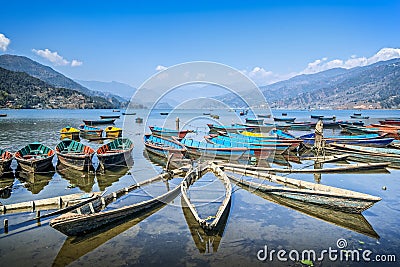 Colorful boats on lake Stock Photo