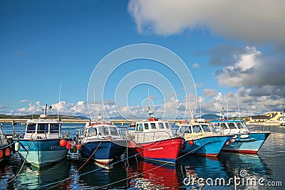 Colorful boats in the port of Portmagee Editorial Stock Photo