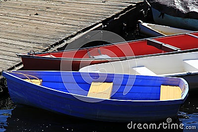 Colorful boats resting at pier Stock Photo